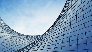A skyscraper covered in glass